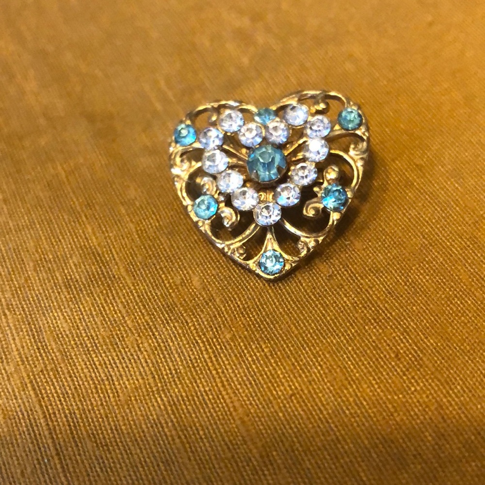 Vintage goldstone brooch with white and aquamarine coloured stones